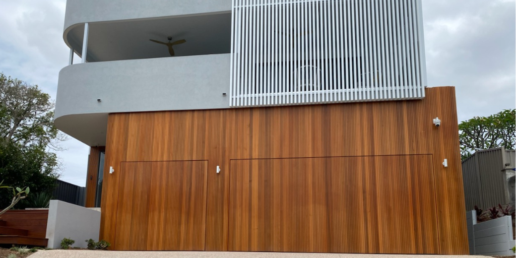 Custom timber tilt garage door installed in Indooroopilly